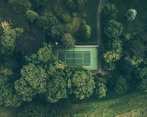 Beautiful tennis court surronded by nature