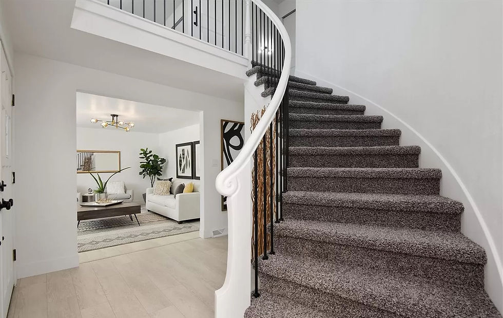 Curated bannister and grand foyer professionally repainted.