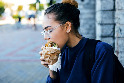 Girl Eating Hamburger