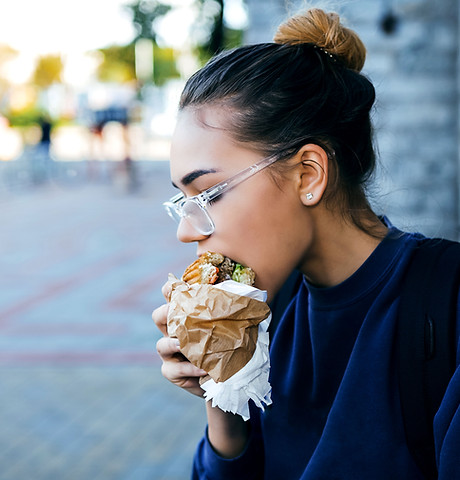 Girl Eating Hamburger
