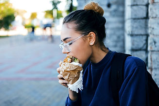 Girl Eating Hamburger