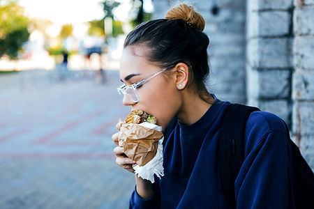 Girl Eating Hamburger