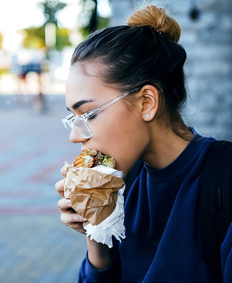 Girl Eating Hamburger