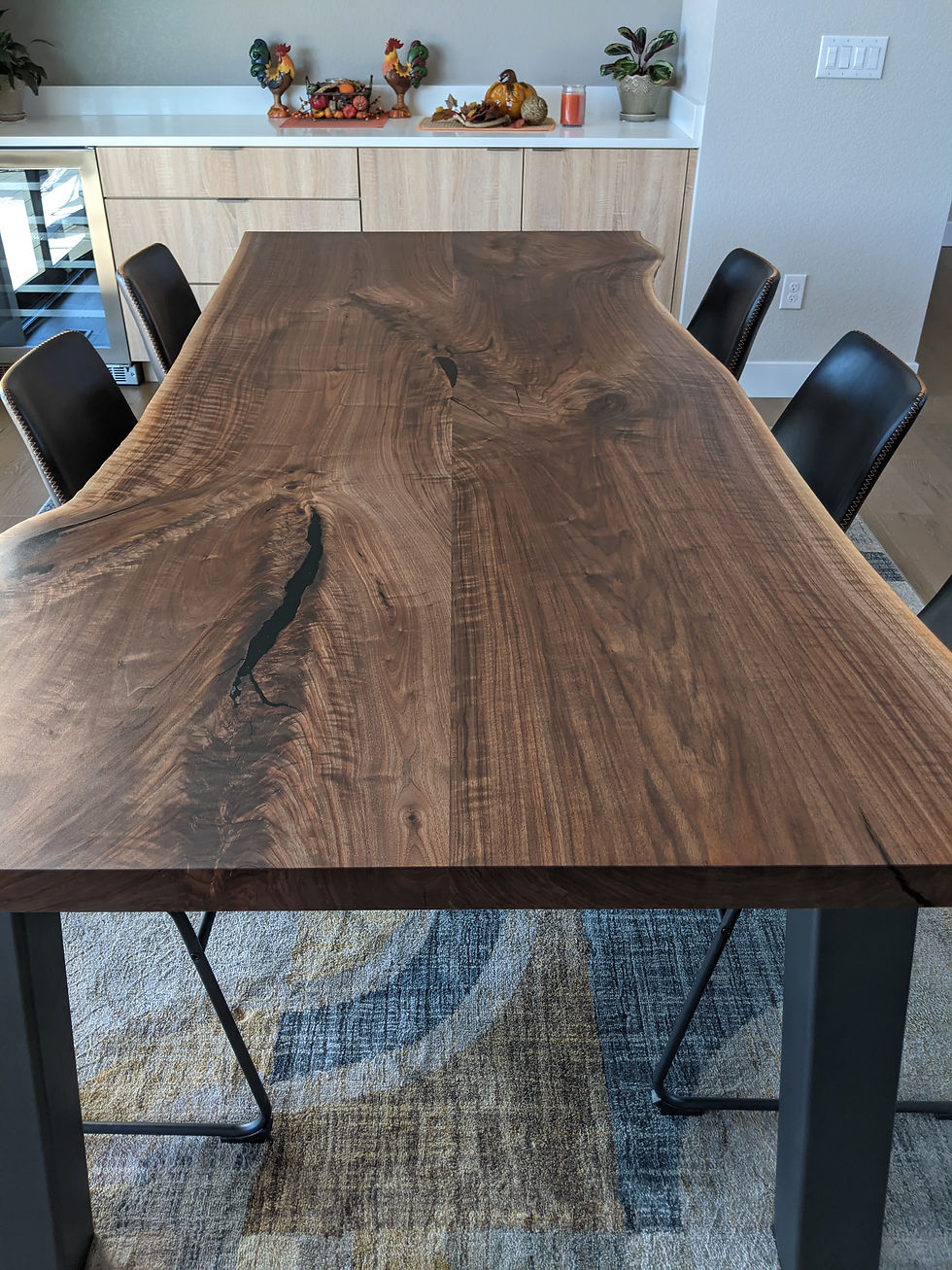 Thumbnail: wood slab and metal dining table