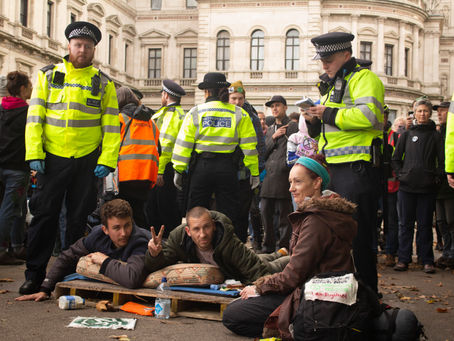 Protesters in climate movement risk getting arrested to call for attention in society