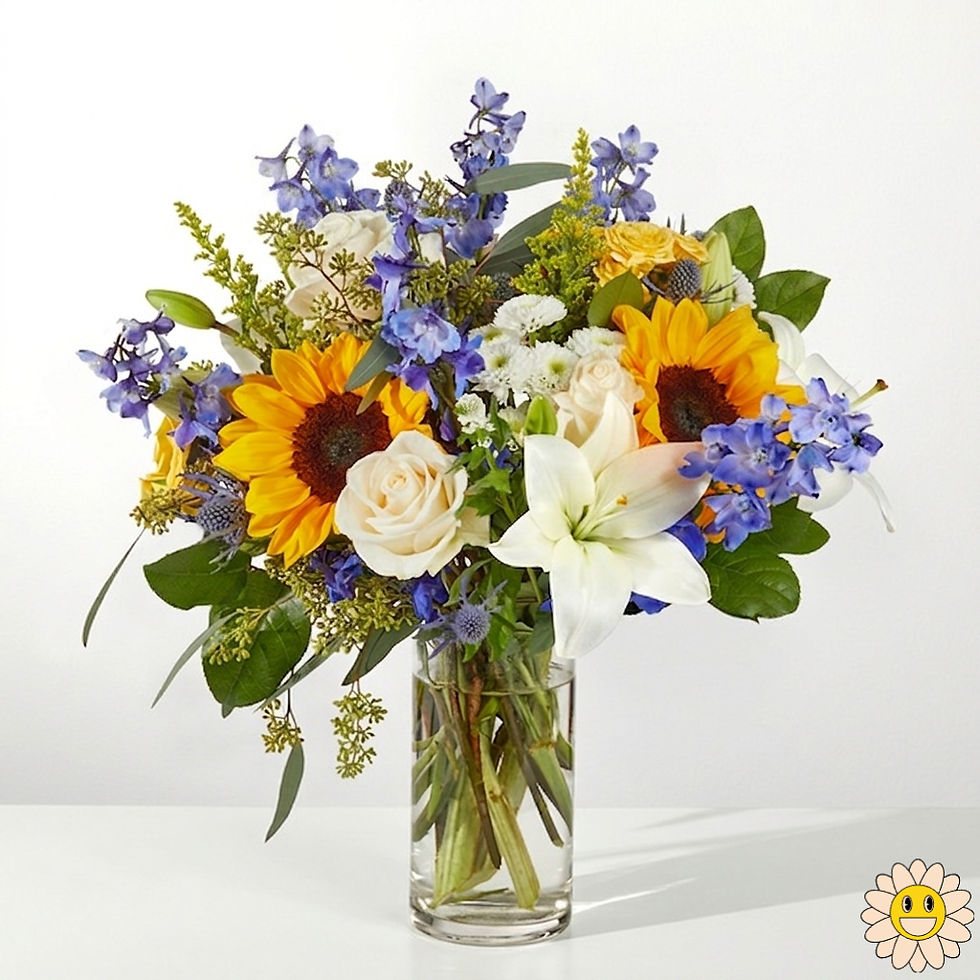 Summer Skies floral arrangement with sunflowers and blue delphinium in a glass vase by Floral Haven YYC Calgary.