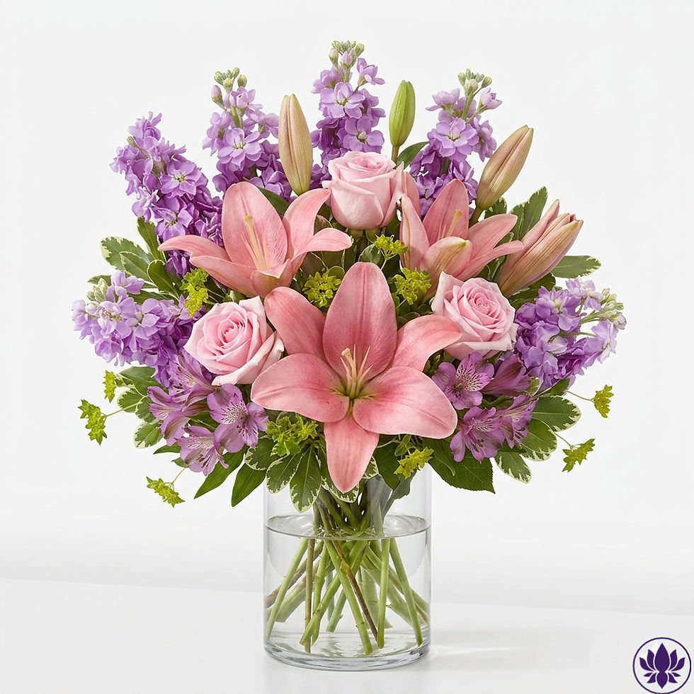 High Blush floral arrangement in a clear glass cylinder by Floral Haven YYC Calgary.