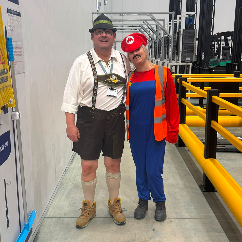 Compliance Team Leader Lyndsay Wright and Reach Truck Driver Wayne Horbury.