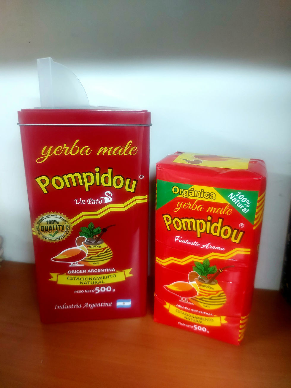 תמונה ממוזערת: קופסת פח עם משפך עם חצי קילו מטה