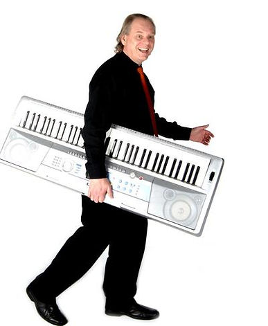 A picture of Gary carrying a keyboard.
