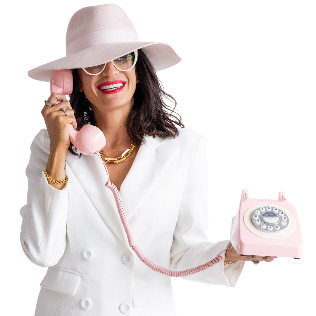 Staci Cretu marketing consultant smiling and holding a pink phone