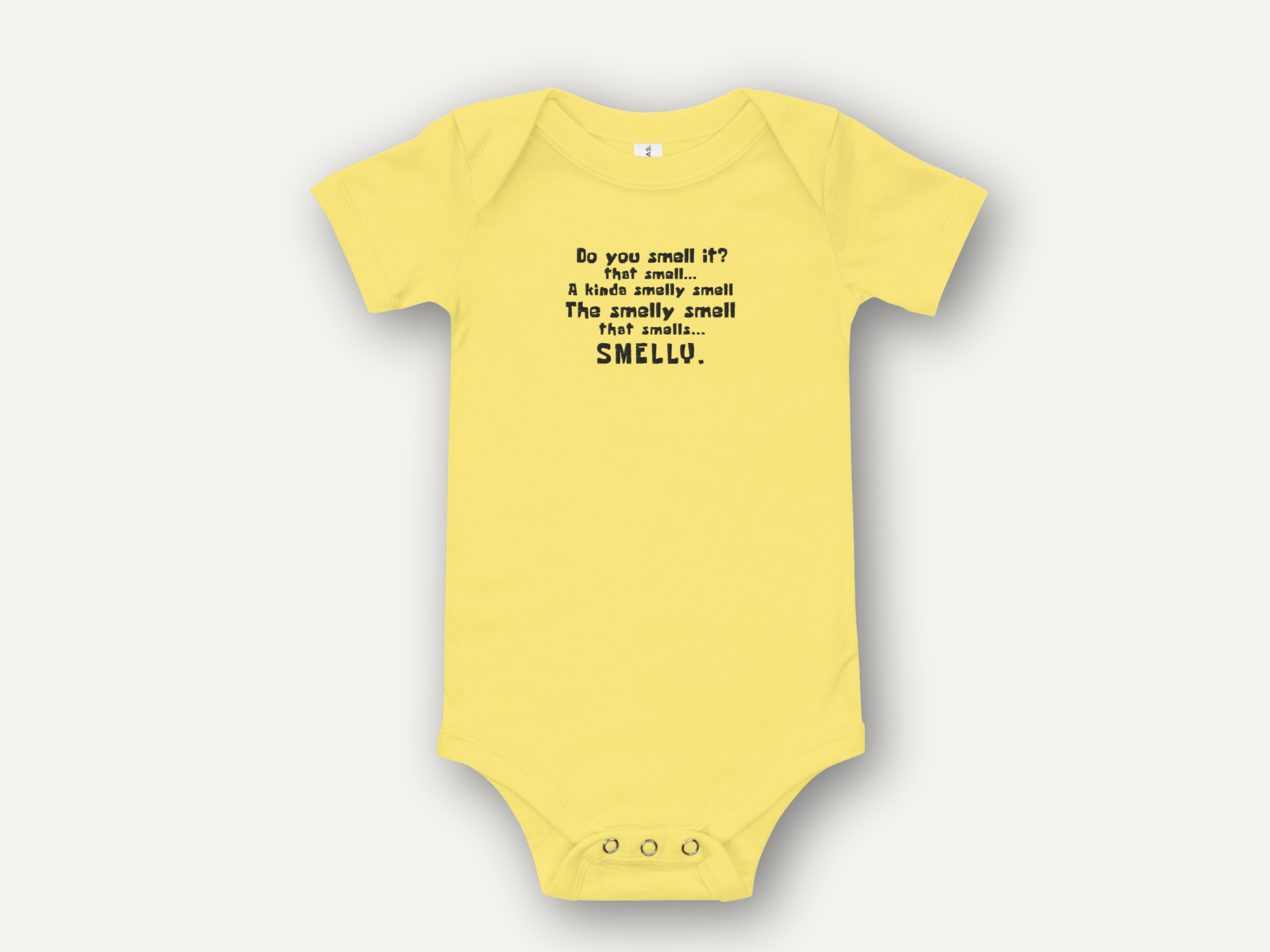 SpongeBob baby onesie with “smelly smell” quote, soft cotton, envelope neckline, snap leg closure.