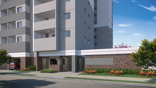 Edifício residencial moderno cinza e branco com entrada e paisagismo.