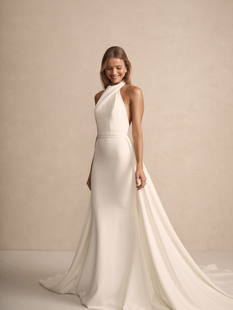 Grayson is the epitome of elevated style and grandeur, mindfully crafted from luxurious French crepe complimented with delicate button accents for the perfect contour. Her open back perfectly contrasts and compliments her couture-look high neckline and full coverage bodice.