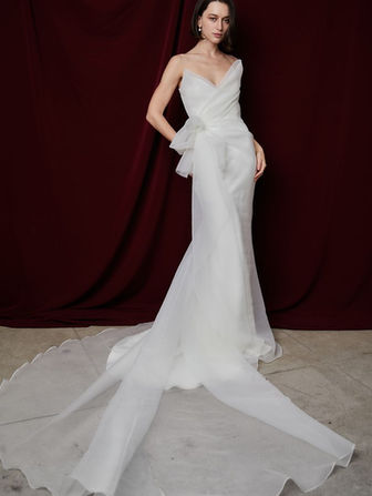 It was in Prophecy that you could foresee yourself saying your vows to the love of your life. She was destined to be your wedding dress - to have the washed organza flow behind you in your photos as you are wrapped around in bliss from saying yes to your best friend while in the most unique - fashion forward gown.