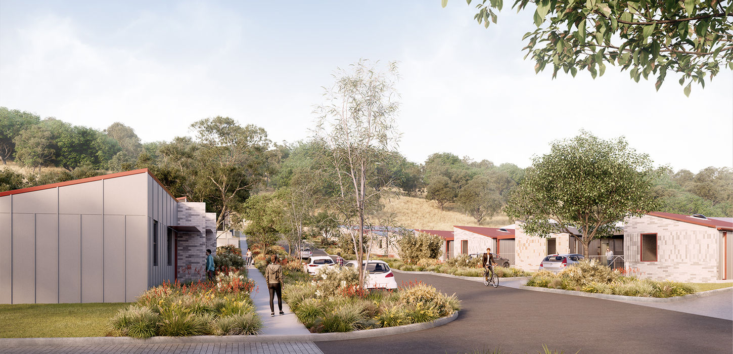 Pathway and landscaping between residential units at Oak Rise, promoting walkability and connection