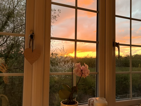 Sunrise out the Window