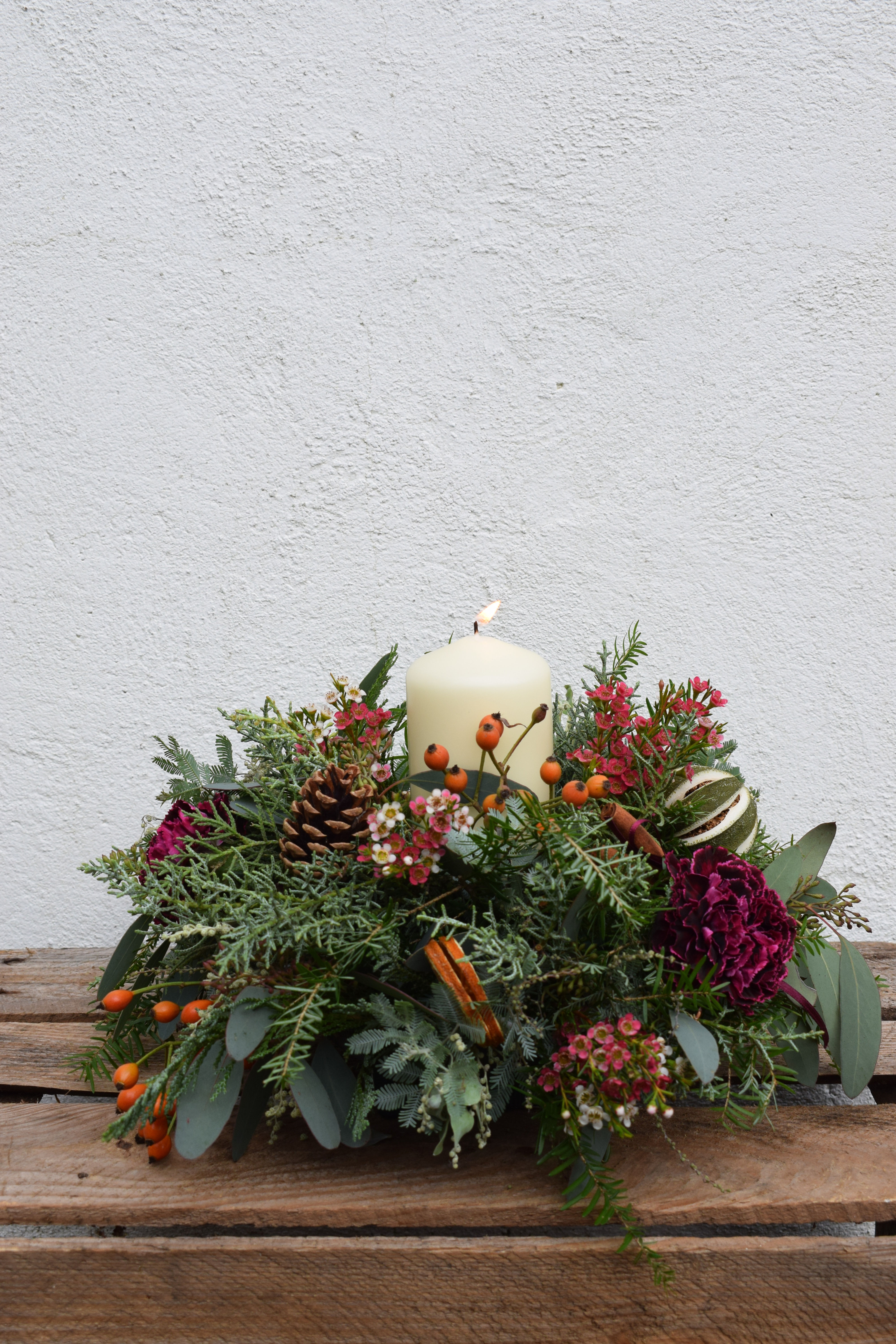 Single Candle With Fresh Flowers