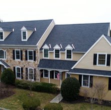 Newtown Square, PA home with a newly replaced roof, showcasing expert craftsmanship and durable materials.