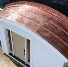 West Chester home with a copper roof over the front door, showcasing craftsmanship, durability, and elegant design.
