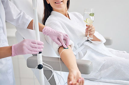 woman-getting-an-iv-therapy-while-relaxing-at-kingsway-dermatology.jpg