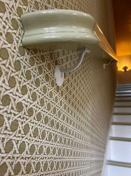 Avocado cane wallpaper precision cut hardware El Cid installation in El Cid Historic District