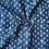 Thumbnail: Indigo handwoven Khadi cotton with white dot dabu print, twisted to highlight fabric texture – 2.5 meters