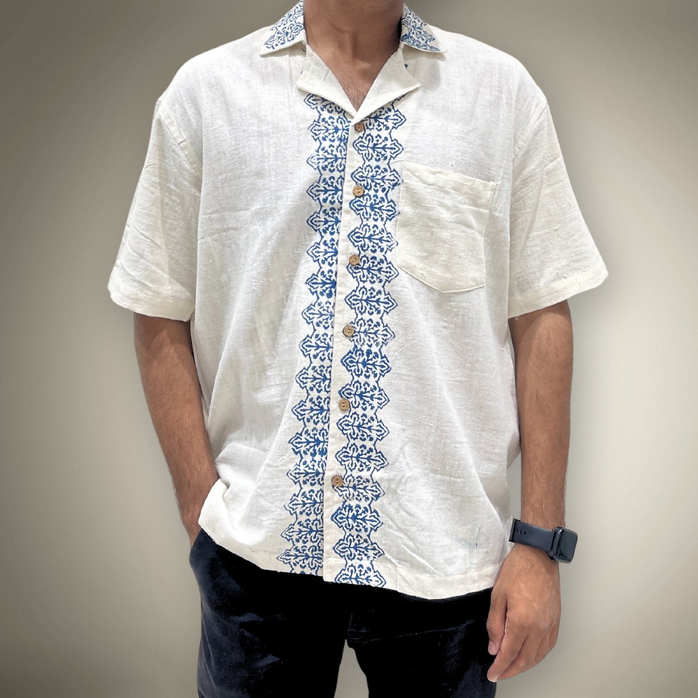 Thumbnail: Model wearing organic khadi men’s shirt featuring central indigo floral block print