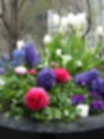 Madison Park planter filled with white, pink, purple flowers and greens