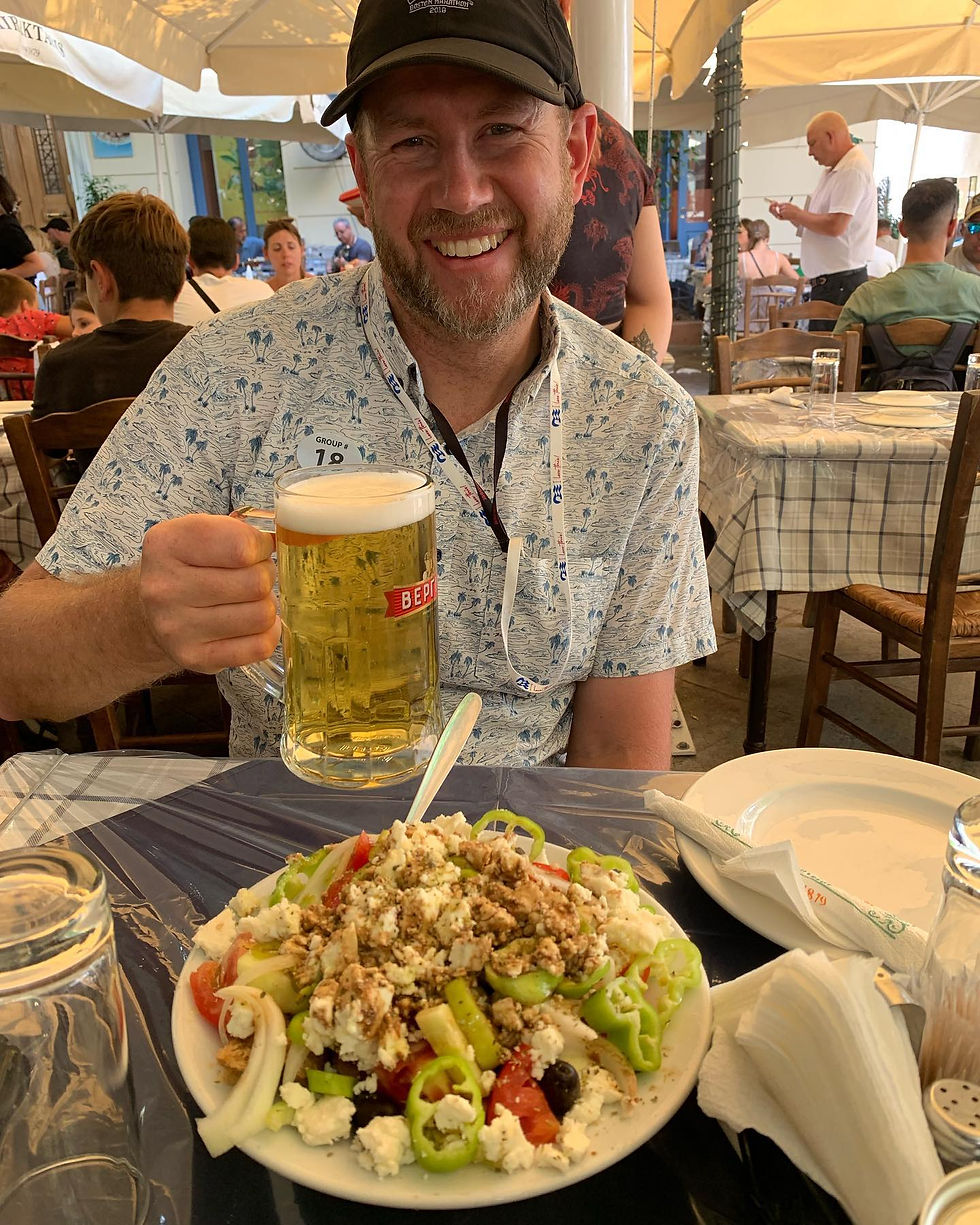 Balanced diet: a salad in one hand, beer in the other. Zeus would be proud