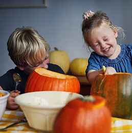 Children Scooping Out Pumpkins