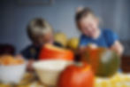 Children Scooping Out Pumpkins