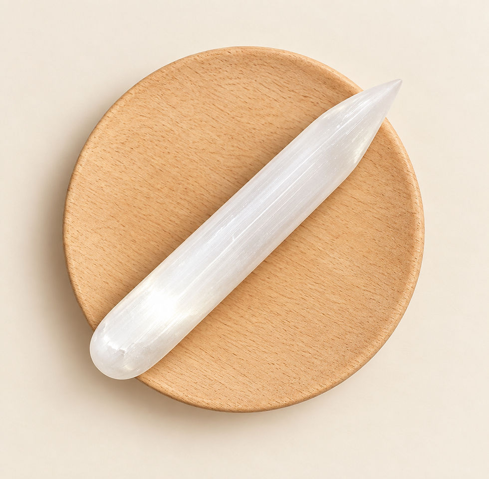 Pointed Selenite Wand displayed on a carved dish