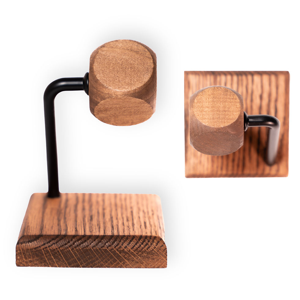 Thumbnail: Handmade charred oak watch stand with a rounded rest and black metal post