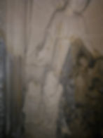 Conservation latex poultice cleaning of decorative carved bath stone figurative relief