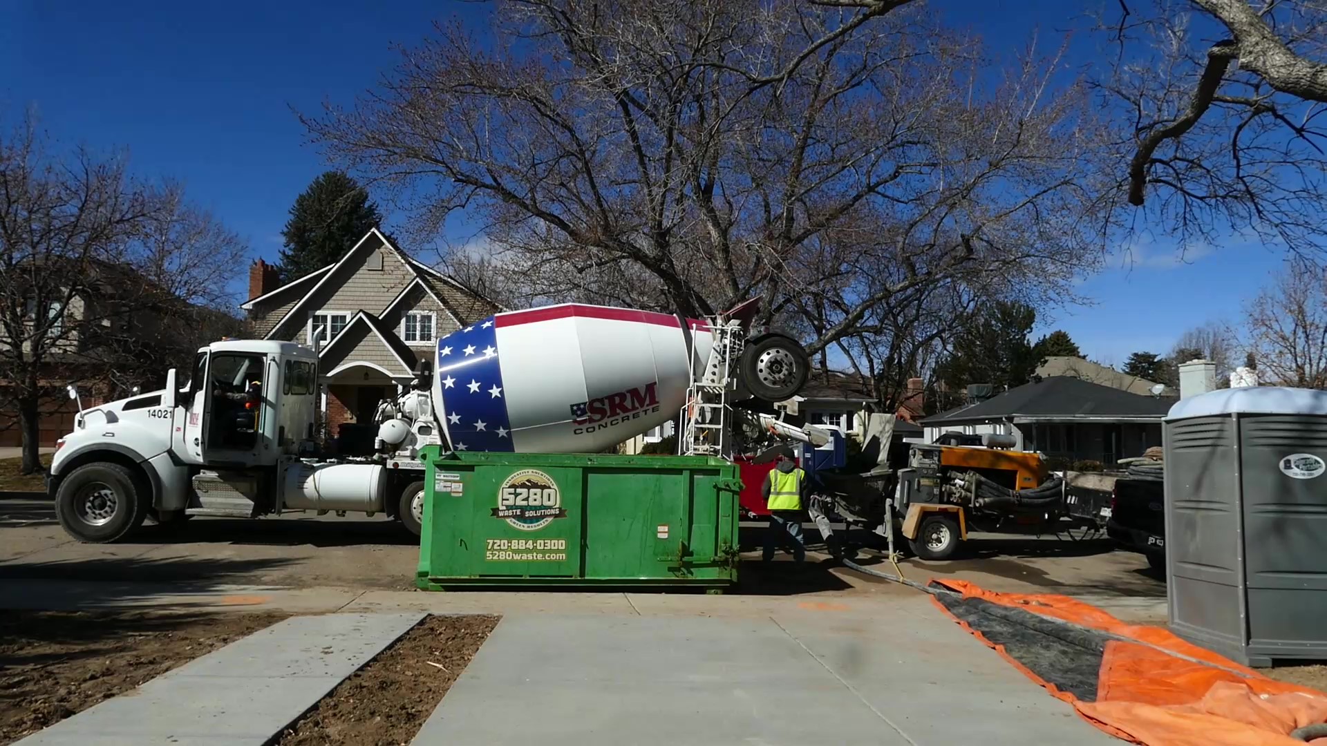 Concrete trucked parked in front of job
