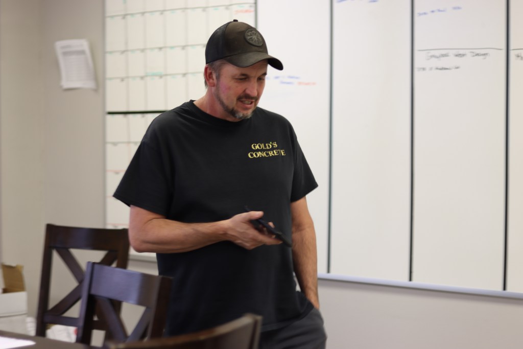 Owner of Gold's Concrete on a conference call