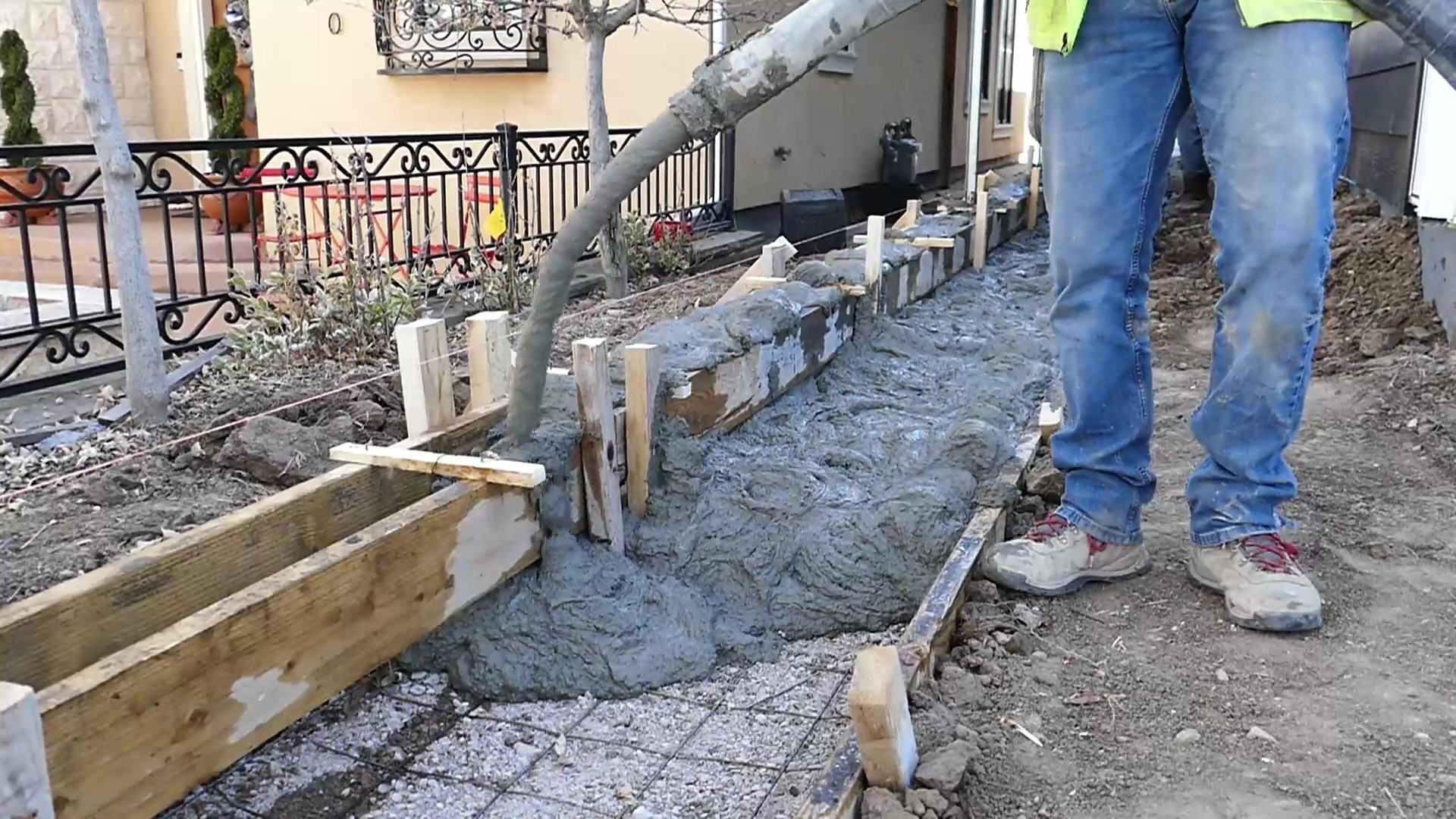 Pumping concrete into curb and gutter