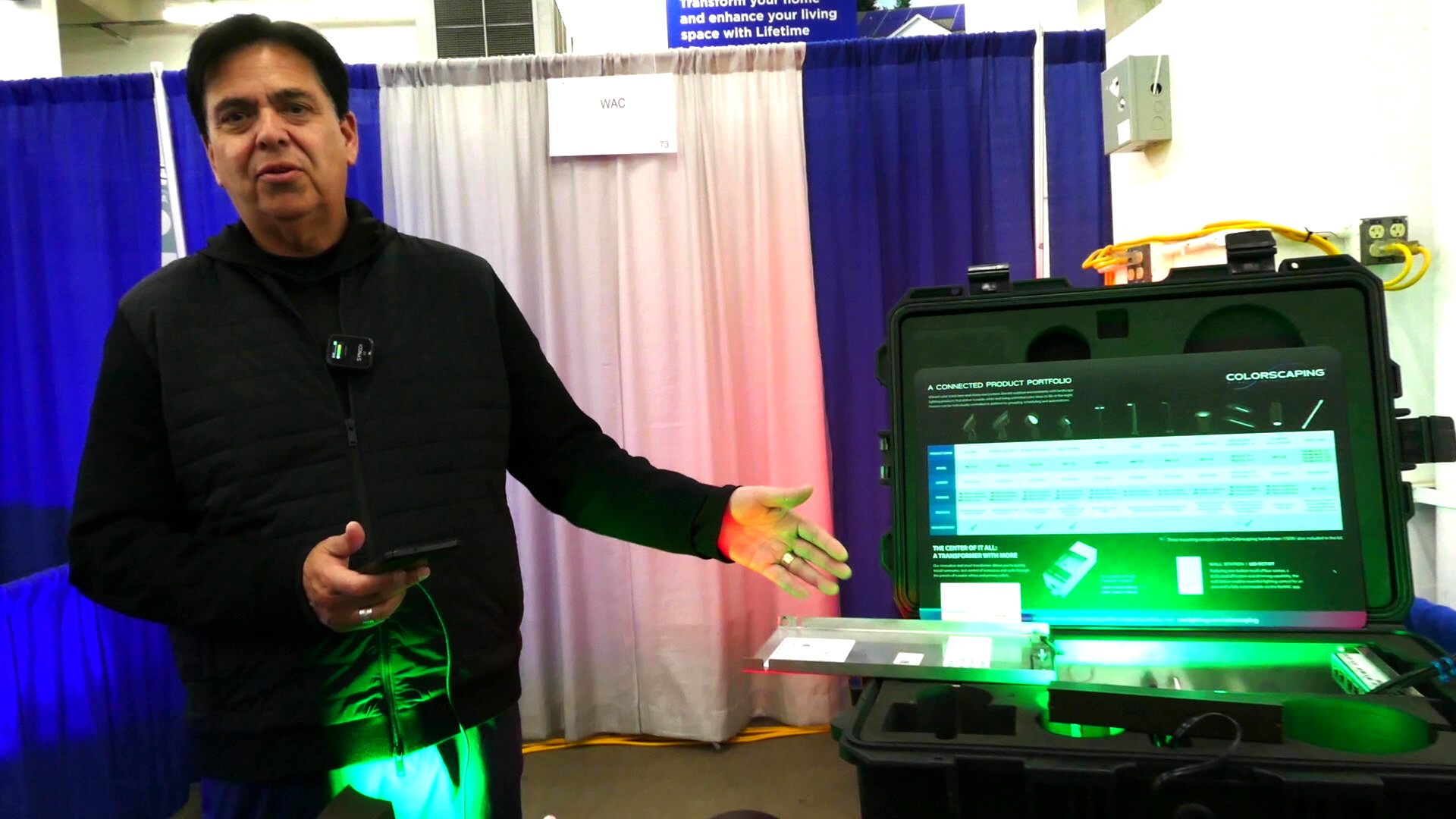 Speaking with a representative from WAC Landscape Lighting at the  CPS Distributors Spring Fling 2024 trade show