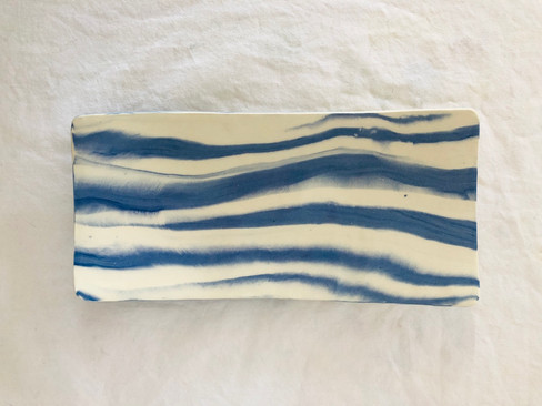 blue and white rectagular plate