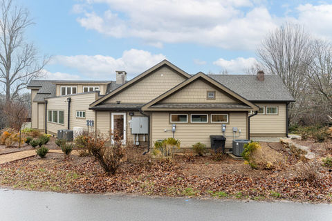 Rear exterior view of Vista Falls Veterinary Hospital showing renovated addition and siding – Buchanan Commercial Construction, Asheville.