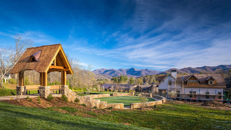 Outdoor pavilion and stonework gathering area under construction with mountain views in the background – Buchanan Commercial Construction, Asheville