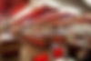 Modern restaurant interior with buffet stations, red accents, and illuminated sushi and grill areas – Buchanan Commercial Construction, Asheville