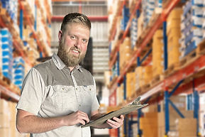 man with clipboard in warehouse.jpg
