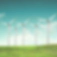 Windmills on green field