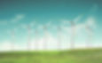 Windmills on green field