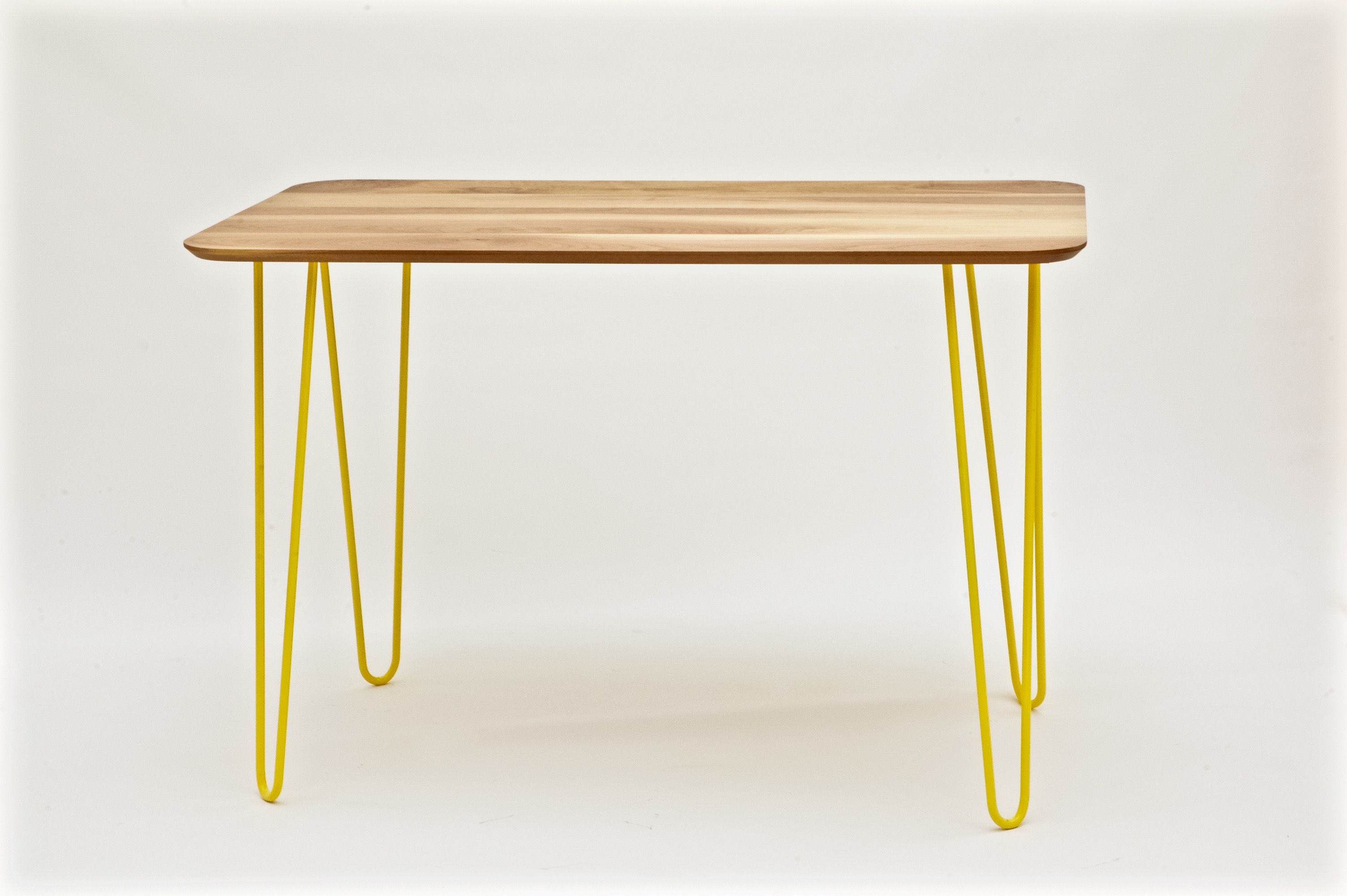 Modern industrial looking table with hairpin legs