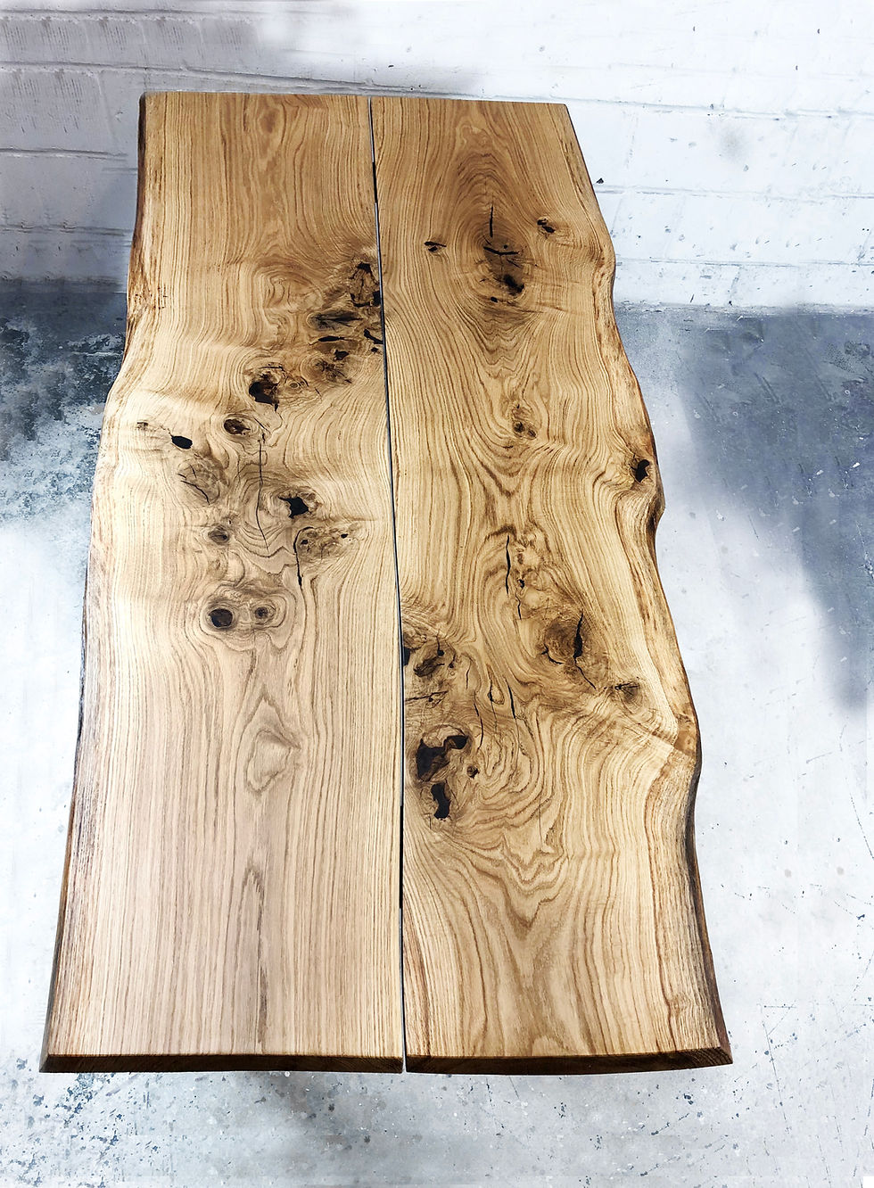 Thumbnail: Live edge solid oak dining table with 2 wooden slabs and 4 wooden angled tapered