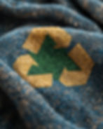 A piece of frabric with a recycled badge on it.