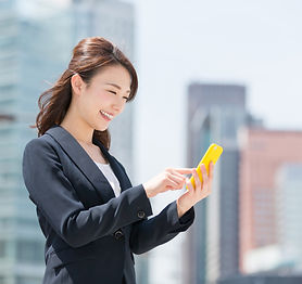 Beautiful young asian woman who see a sm